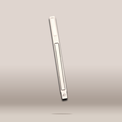 A slim, off-white plastic replacement brush or applicator tool with a rectangular slot, shown floating vertically against a neutral beige-gray gradient background.