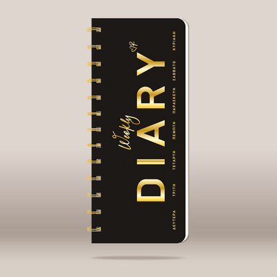 A black spiral-bound weekly diary with elegant gold foil lettering on a light beige background.