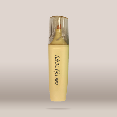 A cosmetic tube with a pale yellow body and a clear cap, featuring the text 'ASAP, like now' in black script, set against a neutral light gray background.