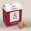 A milk carton-style box of 'Love Cookies' by the brand Rene, featuring a deep red body, a white top flap, and a beige front label with a heart illustration. Two round golden-brown cookies are placed in front of the box on a light beige background.