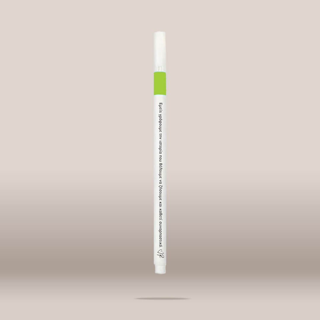 A single white cosmetic pen-style applicator with a bright green band near the top and black printed text, shown centered against a soft beige gradient background.