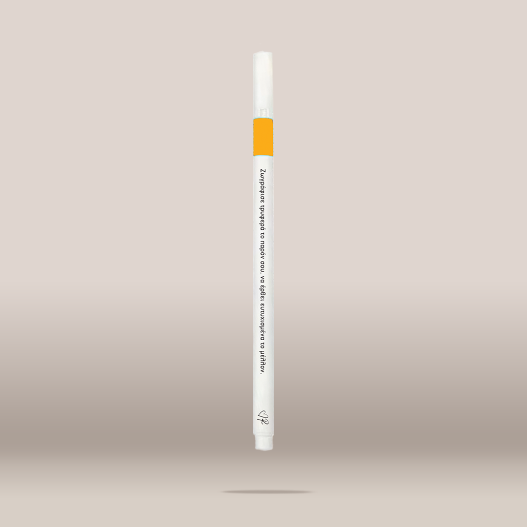 A single white cosmetic pen or applicator with a bright orange band near the top, shown vertically against a soft beige gradient background. Small black text is printed on the barrel, and a small logo appears near the bottom.