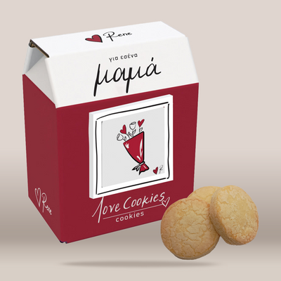 A milk-carton-style box of 'rene' brand cookies, featuring a deep red and white design with a bouquet of red hearts illustration, shown alongside two golden-brown round cookies on a neutral beige background.