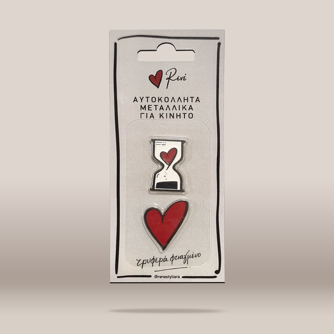 A packaged set of two enamel pins from the brand Renei, featuring a silver hourglass pin with a red heart and a solid red heart pin, both mounted on a white backing card with Greek text.