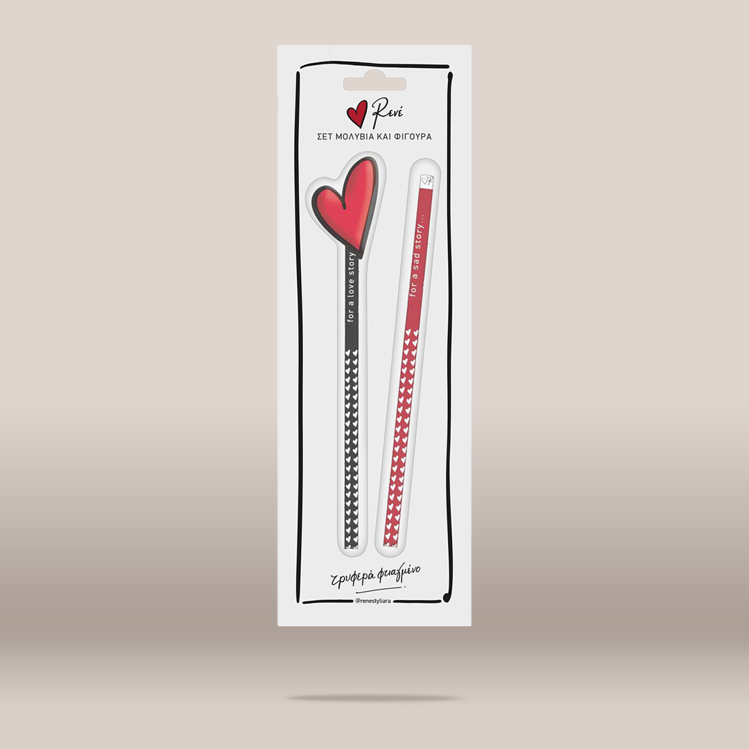 A packaged set of two decorative pencils from the brand Pen, featuring one black pencil with a red heart and the other a red-and-white patterned pencil, both inside a tall white display card on a neutral beige background.