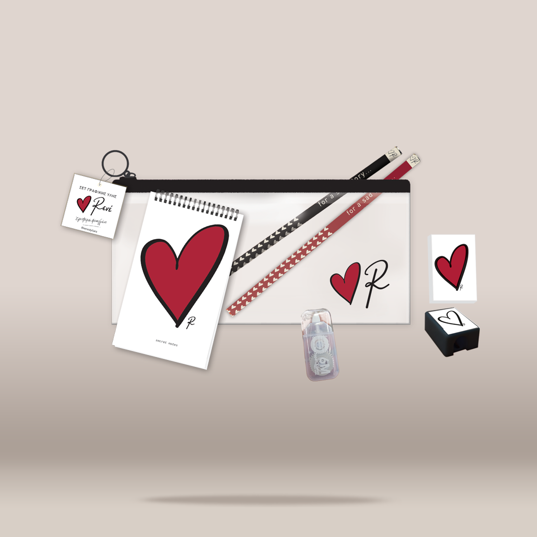 A coordinated stationery set arranged on a light warm gray background: a white zip pouch with a black zipper, a spiral-bound notebook with a large red heart and black script letter P, two heart-patterned pencils, a small white tag, a clear plastic case, a small black-and-white heart box, and a matching heart stamp or coaster.