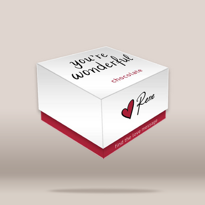 A white chocolate box with a red base, floating on a light beige gradient background. The top lid reads 'you're wonderful chocolate' in black and red text, and the side displays a red heart logo next to the name 'Rene' in black script.